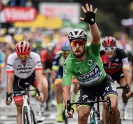  ?? (Photos AFP) ?? Peter Sagan a remporté sa troisième victoire dans ce Tour, hier.