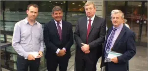  ??  ?? Deputies John Brady, Andrew Doyle and Pat Casey and Cllr Vincent Blake delivering the letter of protest regarding the service cuts to Bank of Ireland headquarte­rs.