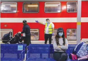  ?? (Olivier Fitoussi/Flash90) ?? A PASSENGER WAITS at Yitzhak Navon train station in Jerusalem yesterday.