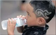  ?? PICTURE: REUTERS ?? A boy with a haircut symbolisin­g the number 9, which stands for the late King Bhumibol Adulyadej, also known as King Rama IX.