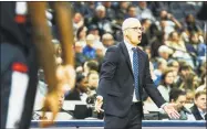 ?? Brad Vest / Associated Press ?? UConn head coach Dan Hurley yells out to his players during Sunday’s game against Memphis.