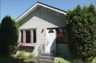  ?? GARY NYLANDER/The Daily Courier ?? Demolition of this house at 770 Cadder Ave. was to begin Wednesday. The home, built in 1921, is coming down to make way for four new residences, the first project approved under the city’s infill housing initiative.