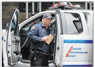  ?? Eduardo Munoz Alvarez The Associated Press ?? New York Police Department officers arrive at the courthouse after powder in an envelope meant for the district attorney’s office was found Friday in New York.