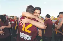  ?? Picture: AAP IMAGE ?? The winning team celebrate after taking down Broadbeach in the QAFL decider.