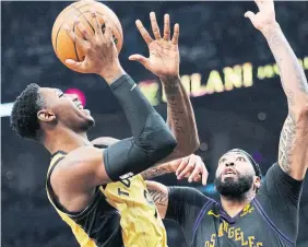  ?? FRANK GUNN THE CANADIAN PRESS ?? Opponents have been seeing more of Raptors guard RJ Barrett's right hand lately, as his coach has been pushing the lefty to focus on his non-dominant hand in workouts.