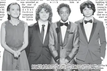  ??  ?? Actors Millie Bobby Brown (left to right), Gaten Matarazzo, Caleb McLaughlin, and Finn Wolfhard speak onstage during the 23rd SAG Awards last month in Los Angeles, California. — AFP photo