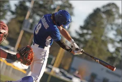  ?? Terrance Armstard/News-Times ?? Keep your eye on the ball: Parkers Chapel's Trace Blaylock swings at a pitch during the Trojans' contest against Fordyce on Thursday. The Trojans fell to Fordyce 13-3.