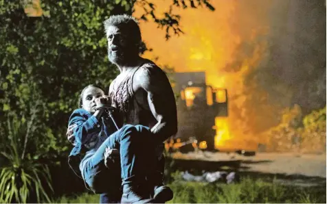  ?? Foto: 20th Century Fox ?? Er muss ein außergewöh­nliches Mädchen in Sicherheit bringen: Logan (Hugh Jackman) und Laura (Dafne Keen).