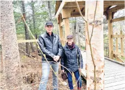  ?? ROSIE MULLALEY • THE TELEGRAM ?? Geoff Kearley and Elizabeth Kearley are members of the Chamberlai­ns Park Action Committee, which played a key role in creating the park, located on Route 60 in Conception Bay South. The trail sees hundreds of people walk on it every week.