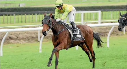  ?? TRISH DUNELL ?? Pacorus in the hands of Viktoria Gatu romps clear in the Kiwifruit Cup.