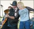  ?? MORNING JOURNAL FILE ?? Monica Robins and the Ninja Cowboys kicked off the season for Bob Earley and his Rockin’ on the River summer concert series, at the Black River Landing, on May 22, 2016.