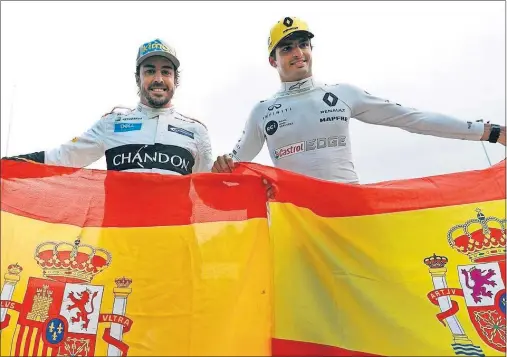  ??  ?? COMPATRIOT­AS Y AMIGOS. Fernando Alonso y Carlos Sainz mantienen una excelente relación y ahora el madrileño irá a McLaren Renault.