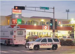  ?? ADOLPHE PIERRE-LOUIS/JOURNAL ?? Albuquerqu­e Police Department detectives investigat­e after two men were shot at a Circle K gas station on University and Menaul NE early Monday morning. Both men have died.