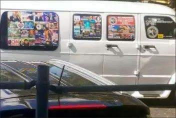  ?? COURTESY OF LESLEY ABRAVANEL VIA AP ?? This Nov. 1, 2017, photo shows a van with windows covered with an assortment of stickers in Well, Fla. Federal authoritie­s took Cesar Sayoc into custody on Friday and confiscate­d his van, which appears to be the same one, at an auto parts store in Plantation, Fla., in connection with the mail-bomb scare that has targeted prominent Democrats from coast to coast.