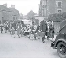  ??  ?? WAR STORY: A map of Fife, 1920s, top; bomb damage in Dundee, 1940, left; and evacuees, above.