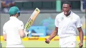  ??  ?? Steve Smith and Kagiso Rabada during the the second Test