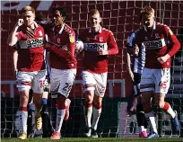  ??  ?? THREE AND EASY Watmore (left) bagged Boro’s third goal