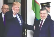  ?? THE ASSOCIATED PRESS ?? President Donald Trump greets Uzbek President Shavkat Mirziyoyev outside the West Wing of the White House on Wednesday.