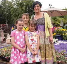  ??  ?? Carol O’Connor with her children Ria, Abbie and Ben O’Connor from Mallow enjoying the Mallow Homes and Garden Festival last year.