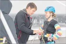  ?? SUBMITTED PHOTO ?? Jillian Sexton, chief operating officer at Hector Building Supplies and co-owner of the Timbermart store in Charlottet­own, preparing to rappel in 2014.