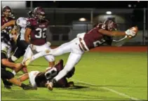  ?? AUSTIN HERTZOG - DIGITAL FIRST MEDIA ?? Pottsgrove’s Rahsul Faison dives into the end zone for a touchdown in the second quarter against Interboro.