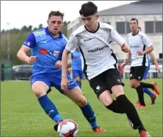  ??  ?? Todd Hynes of Wexford Bohs is chased by Alan Rhodes of North End.