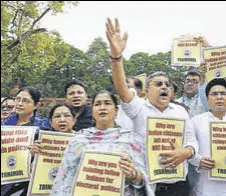  ?? HT FILE ?? TMC Party leaders shout slogans against Modi government while protesting against NRC in Parliament.