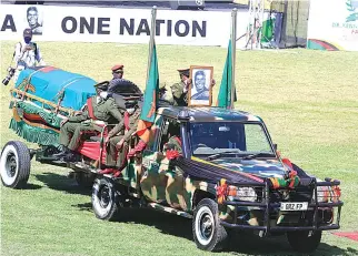  ??  ?? The hearse carrying the body of the founding father and former President of Zambia, Dr Kenneth Kaunda, arrives at Lusaka Showground­s in Zambia yesterday