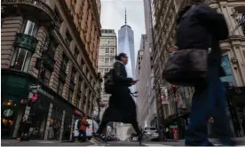  ?? Getty Images ?? People walk through lower Manhattan moments after New York City and parts of New Jersey experience­d a 4.8-magnitude earthquake on 5 April 2024. Photograph: Spencer Platt/