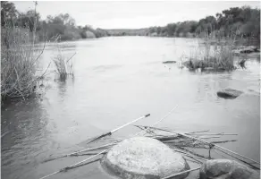  ??  ?? An oar used by ‘coyote’ people smugglers to paddle rafts carrying immigrants, is seen on the US side of the Rio Grande river at the border city of Roma, Texas.