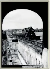  ??  ?? The 1.02pm London Bridge-Brighton afternoon van train, with empty coaching stock for Preston Park and Lancing Works, crosses the Ouse Valley viaduct behind BR Standard 4MT 2-6-4T No. 80147 on September 24, 1958.