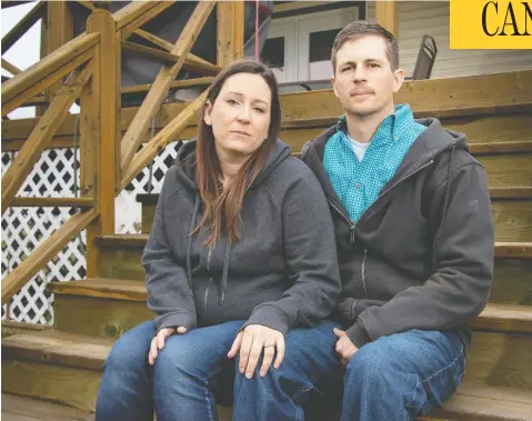  ?? MIKE DREW/POSTMEDIA NEWS ?? Jessica and Eddie Maurice sit at their home near Okotoks, Alta. Maurice is being sued by a man who had trespassed on their property.