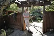  ?? ?? Michael Donohue in front of his serene Japanese-style garden.