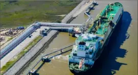  ?? Lindsey Janies/Bloomberg ?? An LNG carrier ship docked at the Cheniere Energy Inc. terminal in 2016.