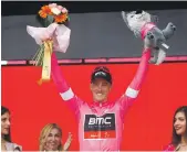  ?? AFP ?? Three bonus points on Stage 2, won by Elia Viviani, gave Rohan Dennis, left, the pink jersey as the overall leader in Giro d’Italia