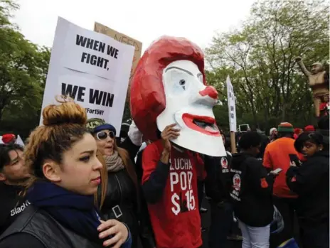  ?? CHUCK BERMAN/TRIBUNE NEWS SERVICE ?? Critics have urged McDonald’s to retire longtime mascot Ronald McDonald and stop marketing to children as it seeks to revive its business.