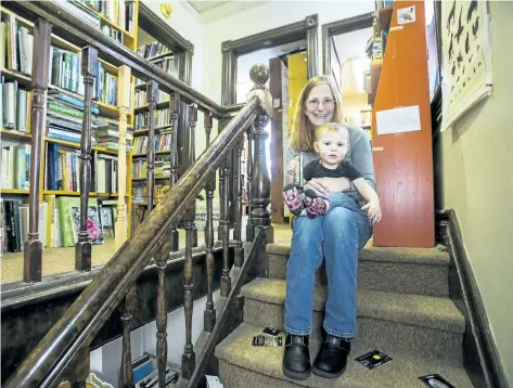  ?? JULIE JOCSAK/STANDARD STAFF ?? Laurie Richards, owner of Hannelore Headley Old and Fine Books is photograph­ed with her granddaugh­ter, Charlee Ledger at her St. Catharines store earlier this month. Richardson is selling the building and looking for a new place to set up shop because...