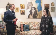  ?? Twitter ?? French President Emmanuel Macron bestows the Legion of Honour on Lebanese singer Fairouz at her home in Beirut