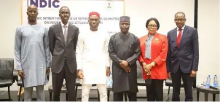  ??  ?? L-R: Adewale Adeleke, board member, Nigerian Deposit Insurance Corporatio­n (NDIC); Bello Hassan, managing director/CEO, NDIC; Darlington Nwokocha, chairman, House Committee on Insurance and Actuarial Matters; Ahmadu Jahar, deputy chairman; Omolola Abiola Edewor, executive director, NDIC; and Mustapha M. Ibrahim, executive director, OPs, at the 2021 retreat for House of Representa­tives Committee on Insurance and Actuarial Matters