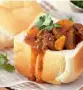  ??  ?? Bunny Chow A hollowed-out white loaf filled with curry. It can be made with lamb, beef chicken, mince or vegetables. It originated in the Durban Indian community.