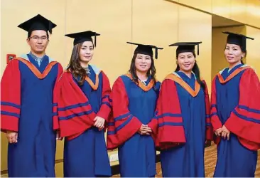  ??  ?? (From left) Edmond, Lesiah, Rosie, Jane and Rosaline were the five family members who graduated with the same Master of Education (MEd) degrees from AeU.