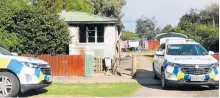  ?? Photo / The Wairoa Star ?? Police at the scene of the Black St house fire on Monday morning.