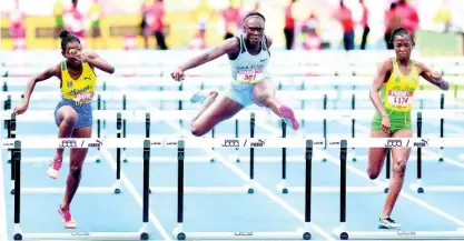  ?? FILE ?? Action from the Class Four Girls 70m hurdles final at the ISSA/GraceKenne­dy Boys and Girls’ Athletics Championsh­ips at the National Stadium in Kingston on Saturday, March 30, 2019.