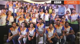  ?? — AP ?? Asiad- bound Indian athletes at a ceremony in New Delhi on Friday.