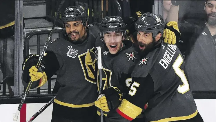  ?? ETHAN MILLER/GETTY IMAGES ?? Tomas Nosek, centre, of the Golden Knights reacts after scoring the game-winning goal in Monday’s Game 1 of the Stanley Cup final in Las Vegas.