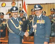  ??  ?? Chief of the Air Staff, Air Chief Marshal Arup Raha after assuming charge from his predecesso­r Air Chief Marshal N.A.K. Browne on December 31, 2013