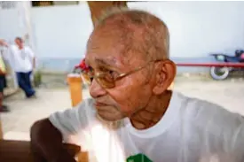  ??  ?? STAYING PUT While his fellow prisoners bolted out of the Leyte provincial jail for the second time in three months, Alberto Encina, 86, decided to stay put. He joined an earlier jailbreak at the height of Supertypho­on “Yolanda” but did not budge this...