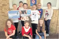  ??  ?? Ysgol Gyfun Garth Olwg pupils outside the Royal Glamorgan Hospital, Llantrisan­t