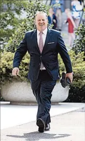  ?? MICHAEL REYNOLDS/EPA ?? Outgoing press secretary Sean Spicer walks outside the West Wing on Friday. He leaves the White House in August.