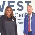  ?? TONYAA ?? Keesha Green, community outcomes and relations coordinato­r at West Cancer Center, and Dr. Kurt Tauer, chief of staff for medical oncology at West Cancer Center, smile after discussing improvemen­ts in getting more African-American women in Memphis to get mammograms. WEATHERSBE­E/THE COMMERCIAL APPEAL